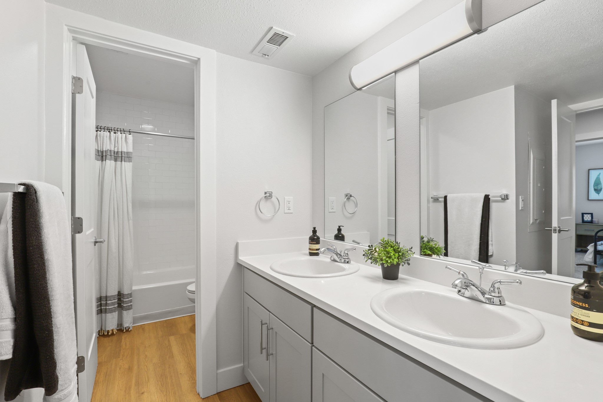Bathroom with double vanity at The Alpine